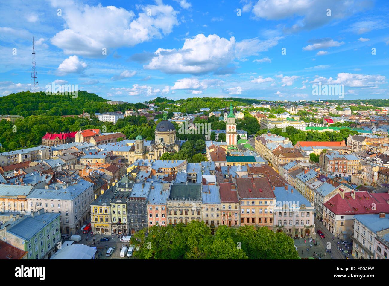 Lviv City skyline. Central part of the old city of Lvov against clouds and the blue sky. Ukraine Stock Photo