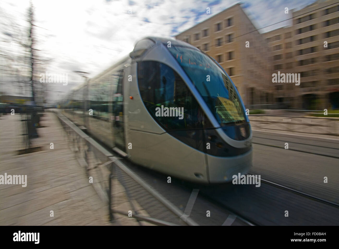 Light train in blurred motion, Jerusalem, Israel Stock Photo