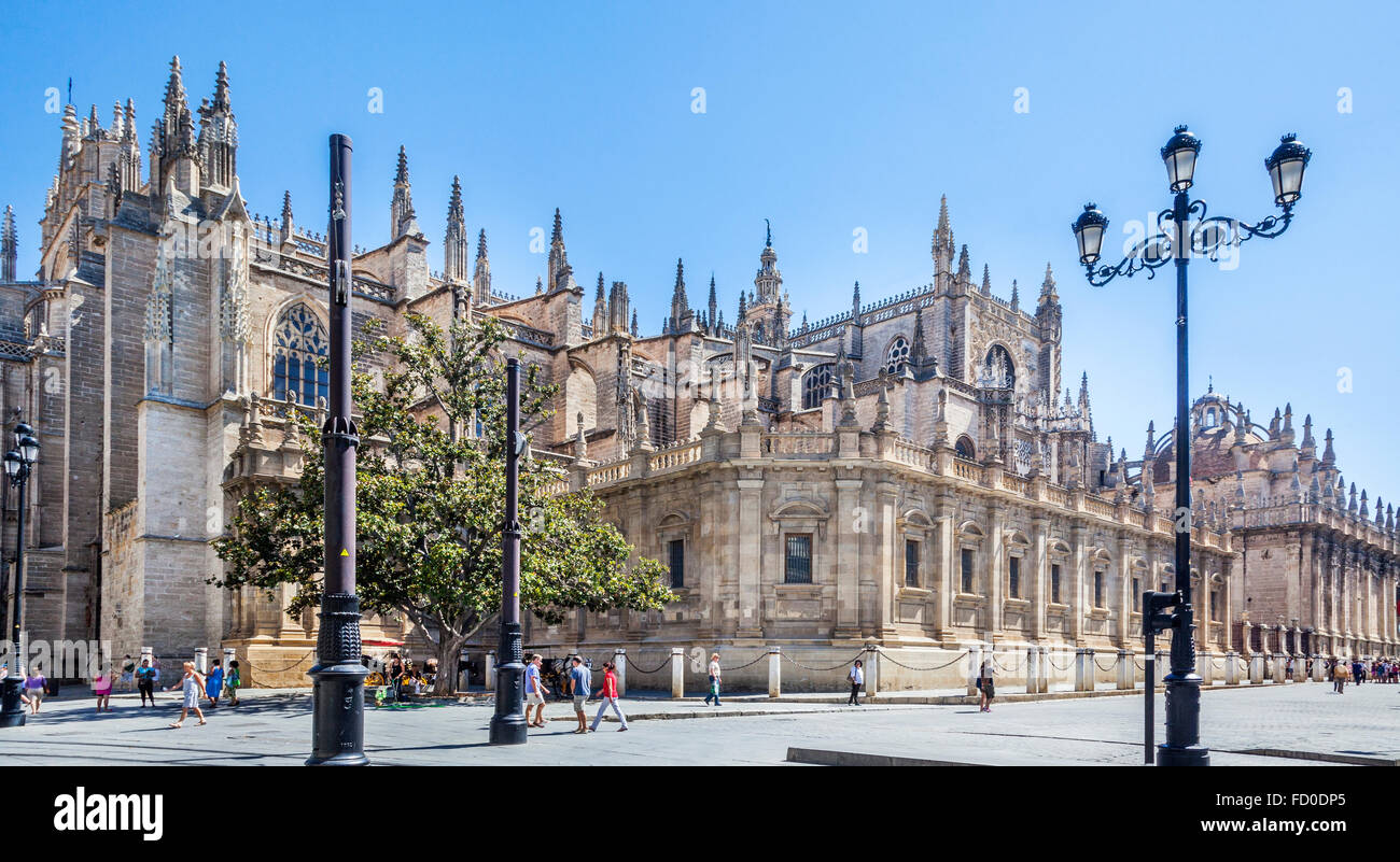 Spain, Andalusia, Province of Seville, Seville, view of the south facade of Seville Cathedral from Avenida de la Constitution Stock Photo
