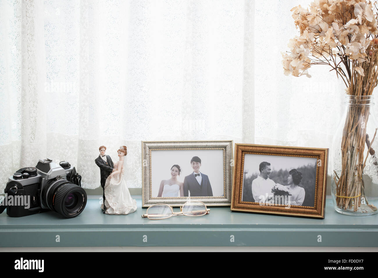 Old and new wedding photos in frames Stock Photo
