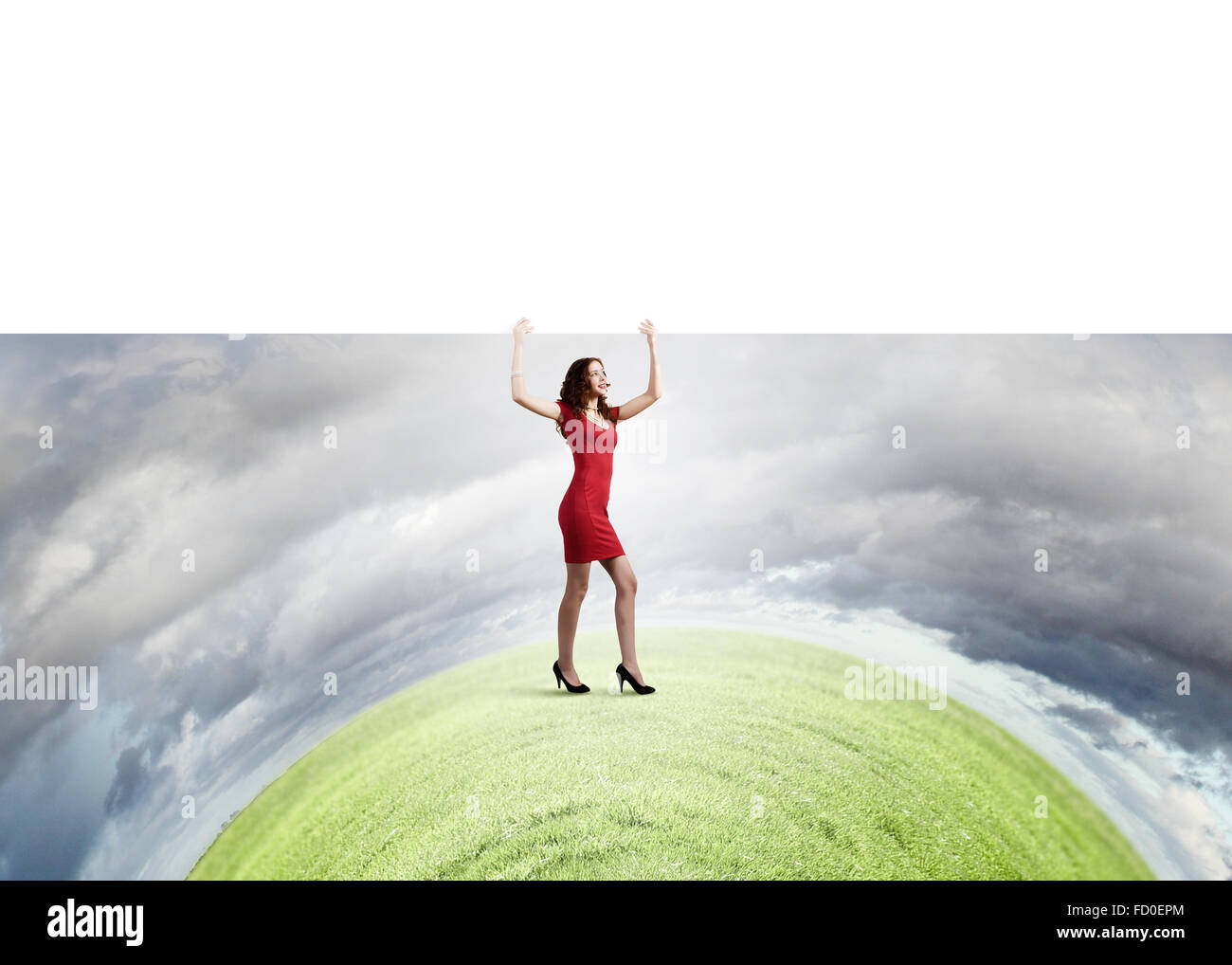 Young woman in red dress holding white blank banner Stock Photo - Alamy