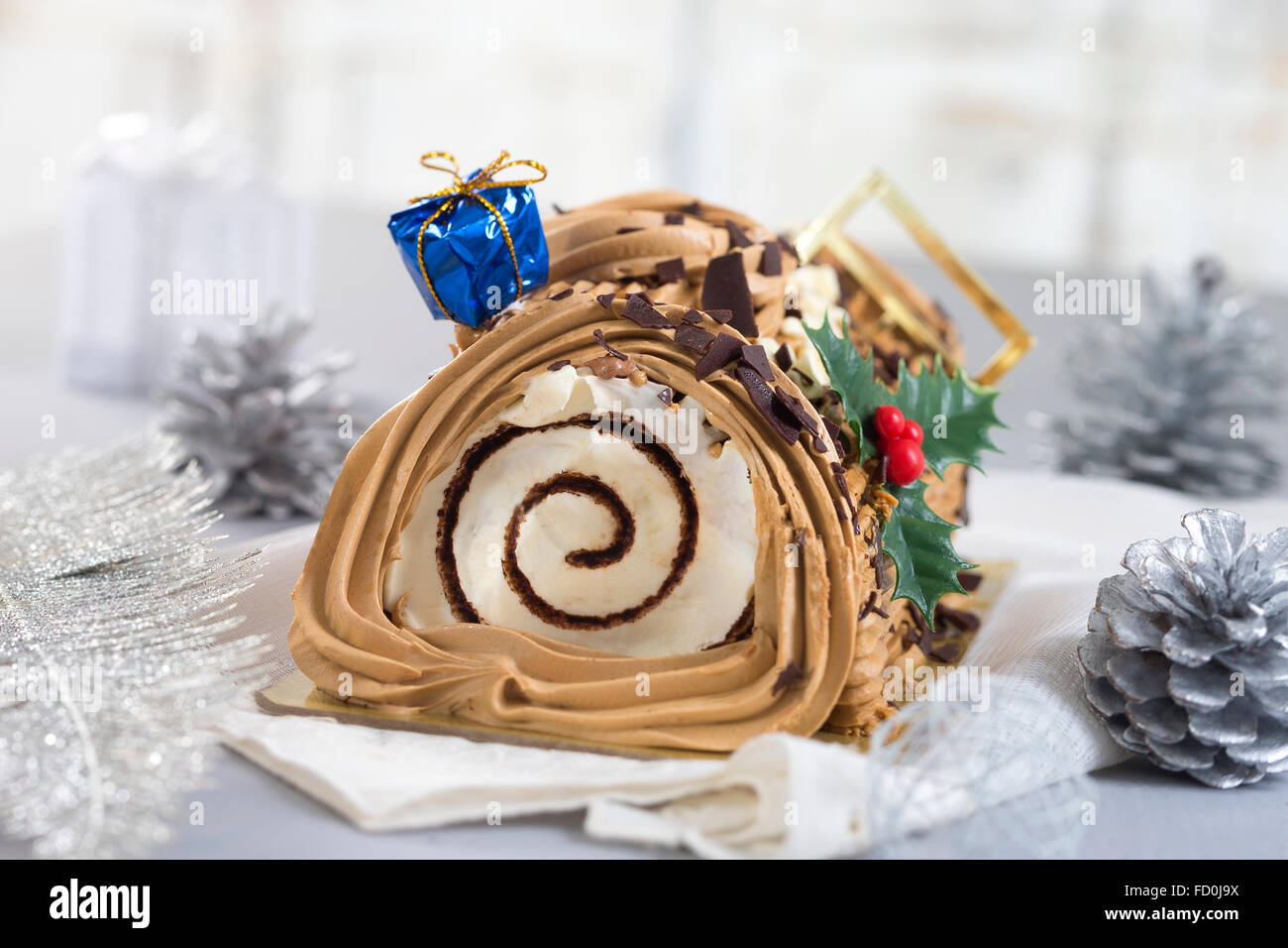 yule log cake, traditional of christmas time dough with coffe Stock