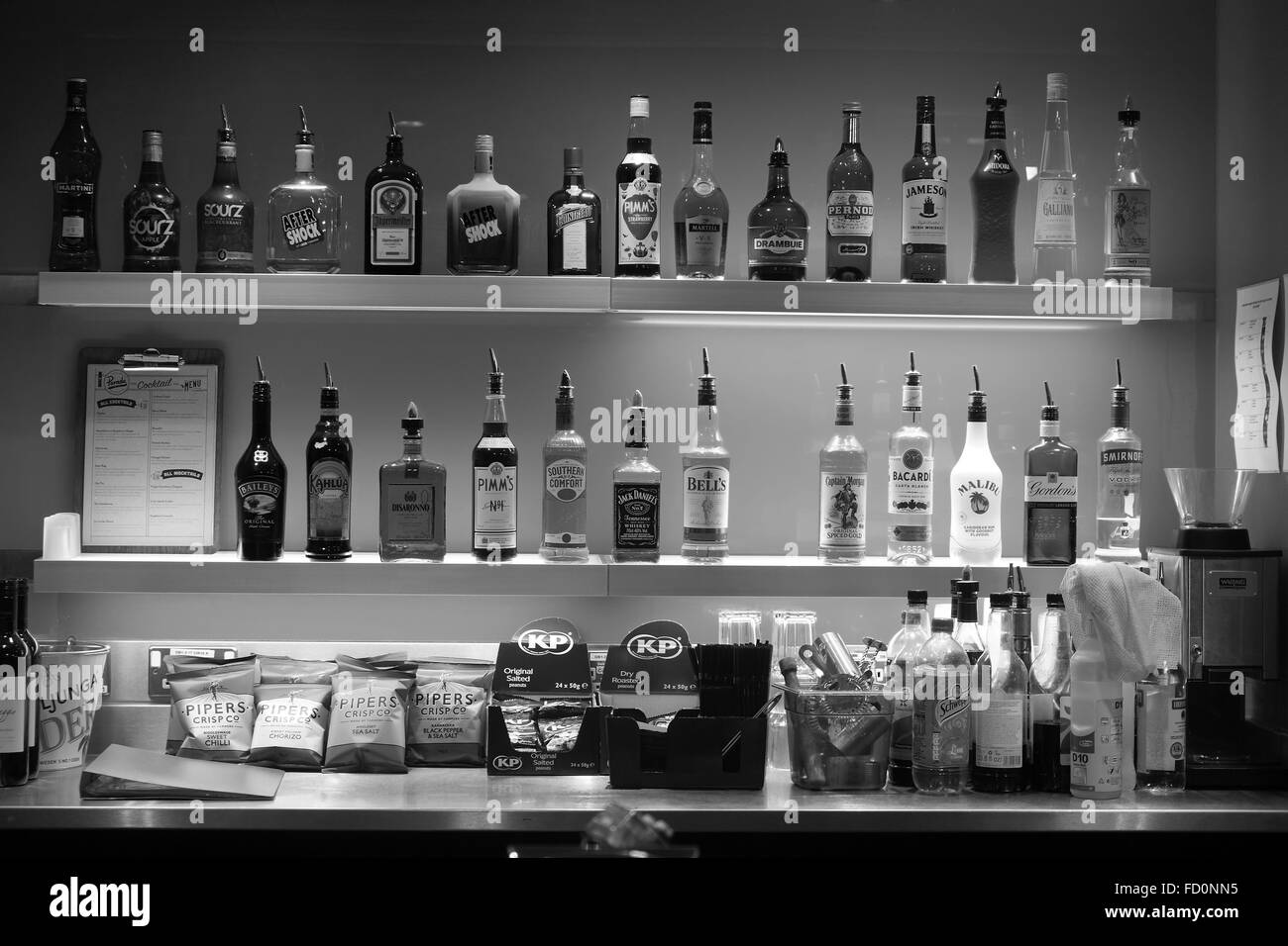 Modern clean display of drinks behind a bar. January 2016 Stock Photo