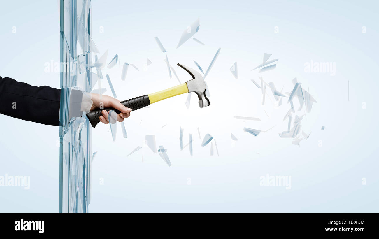 Close up of male hand breaking glass with hammer Stock Photo Alamy