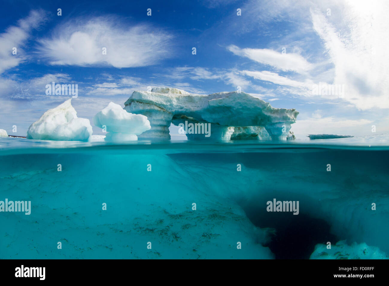 Canada, Nunavut Territory, Repulse Bay, Underwater view of melting iceberg in Harbour Islands on Hudson Bay just south of arctic Stock Photo