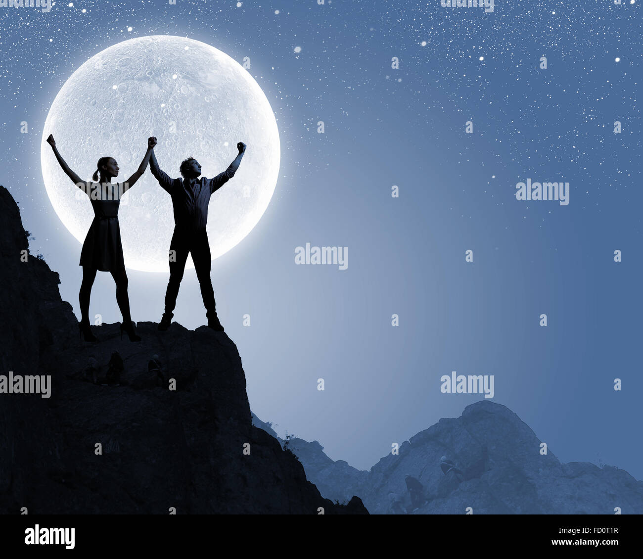 Silhouettes of young couple against full moon Stock Photo - Alamy