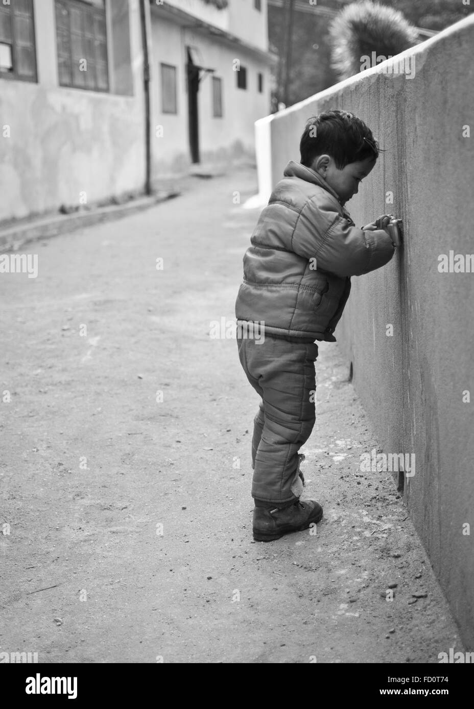Child at Tibetan Refugee Self Help Centre, Darjeeling, India Stock Photo