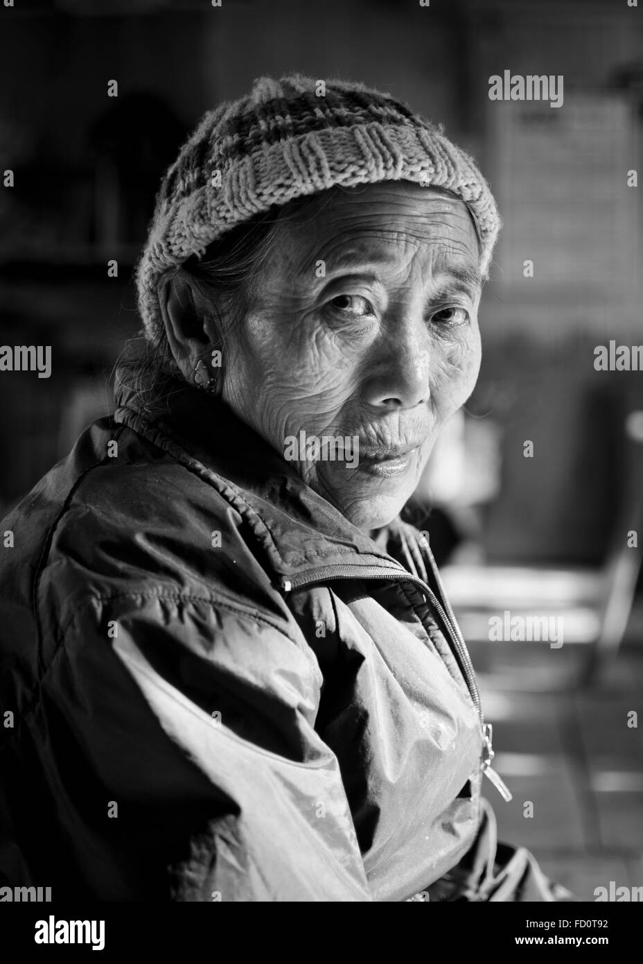 Tibetan Woman in Tibetan Refugee Self Help Centre, Darjeeling, India Stock Photo