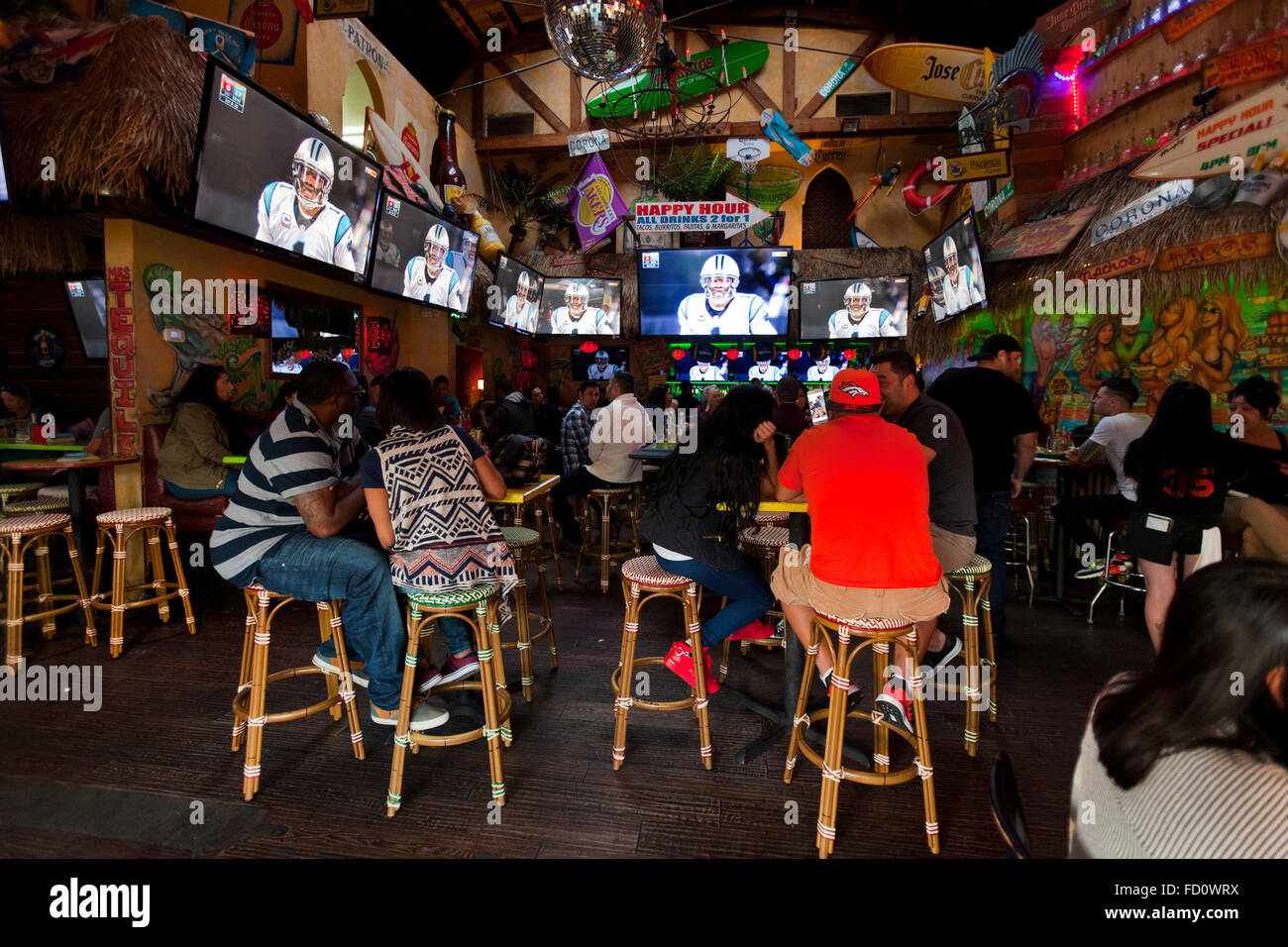 Watching the NFL playoffs in a restaurant - Cabo Cantina - on Hollywood Boulevard, Hollywood, Los Angeles, California, USA Stock Photo