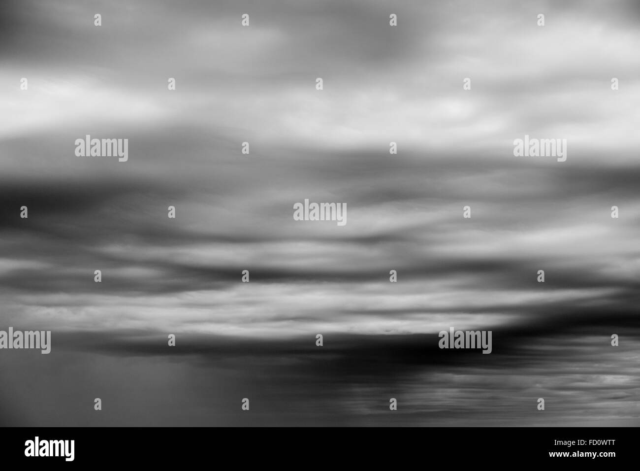 Canada, Nunavut Territory, Storm clouds gather above west coast of Hudson Bay south of Inuit village of Arviat Stock Photo