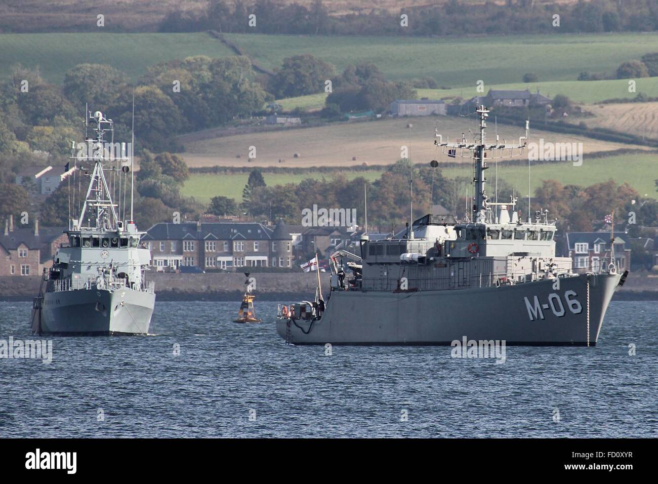 FGS Datteln (German Navy, left) and LVNS Talivaldis (Latvian Navy, right), sit anchored off Greenock before Joint Warrior 14-2. Stock Photo