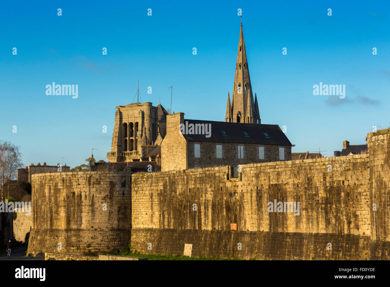Medieval wall and church Notre Dame, Guingamp,Cotes d Armor, Brittany, France Stock Photo