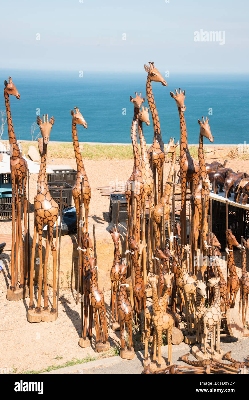 Carved African giraffes for sale on roadside, Cape Peninsula, City of Cape Town, Western Cape Province, Republic of South Africa Stock Photo