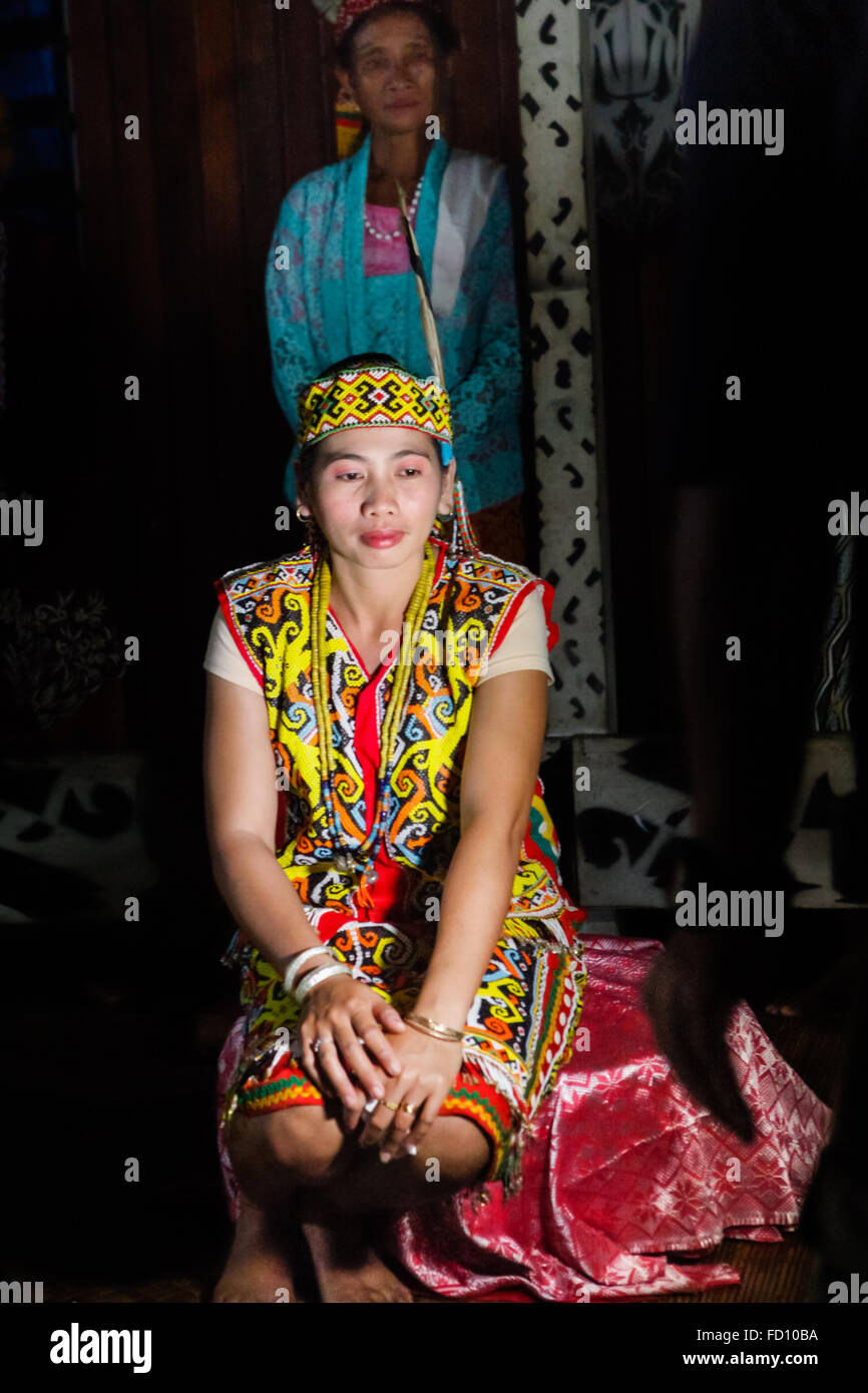 Portrait of young women in traditional attire during an ecotourism event at Bali Gundi longhouse in Kapuas Hulu, West Kalimantan, Indonesia. Stock Photo