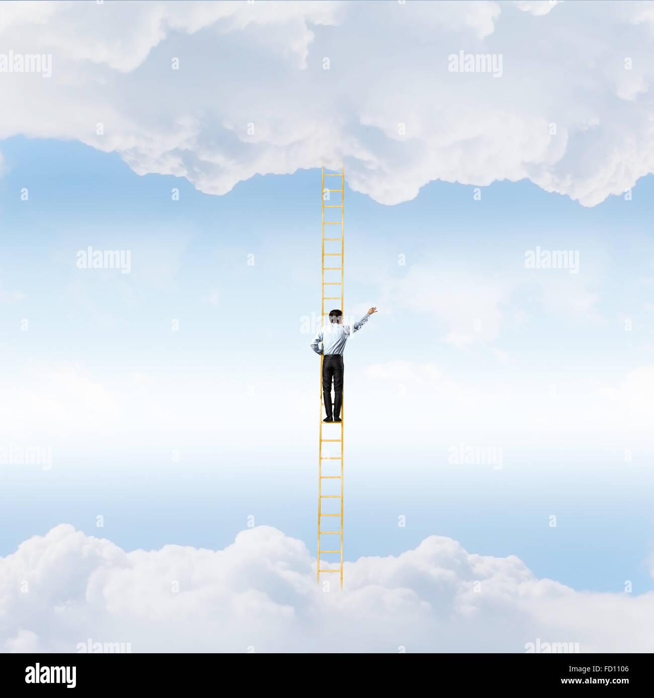 Businessman standing on ladder high in sky Stock Photo - Alamy