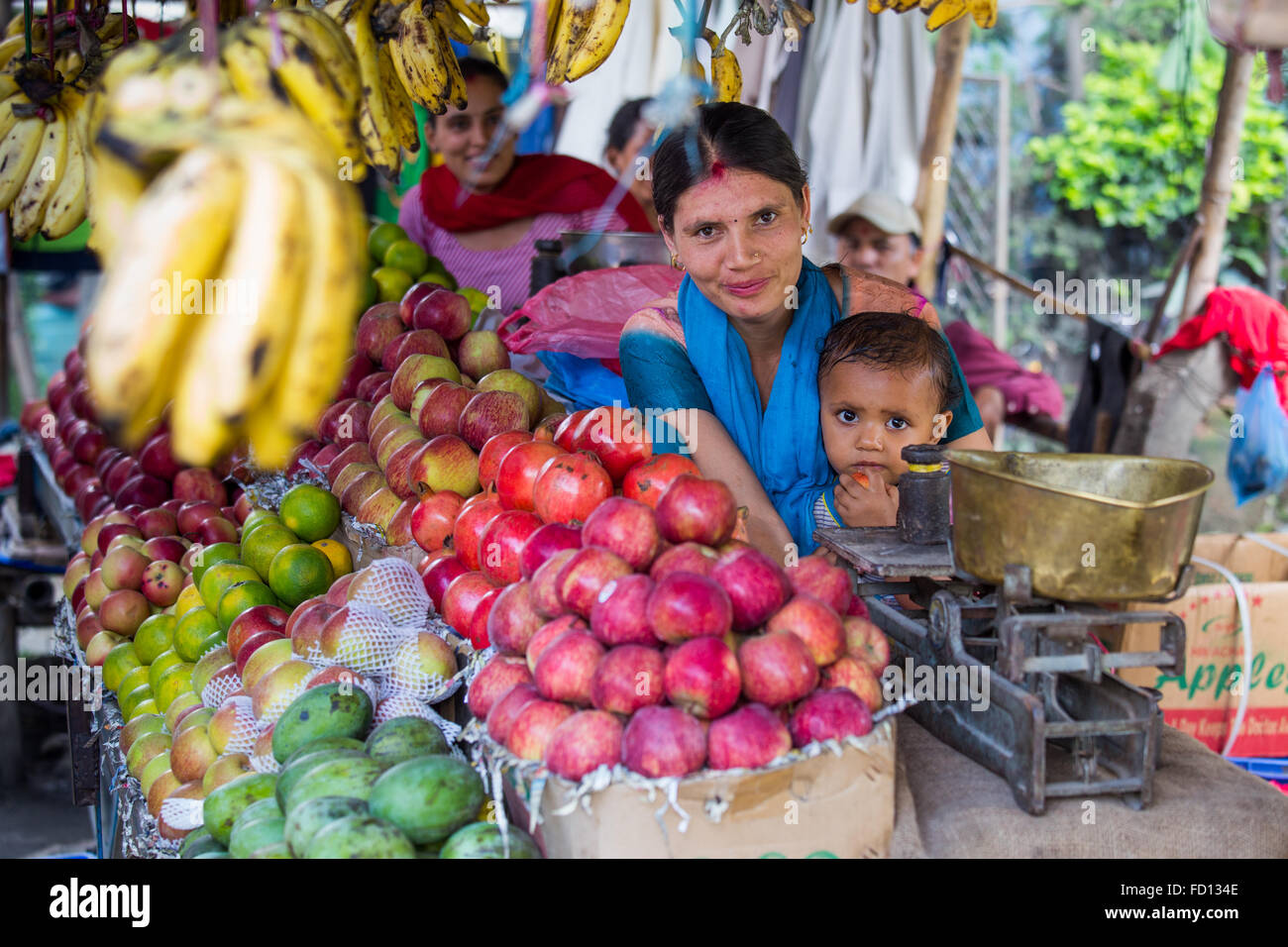 Mother and baby in a market in Kathmandu, Nepal Stock Photo Alamy