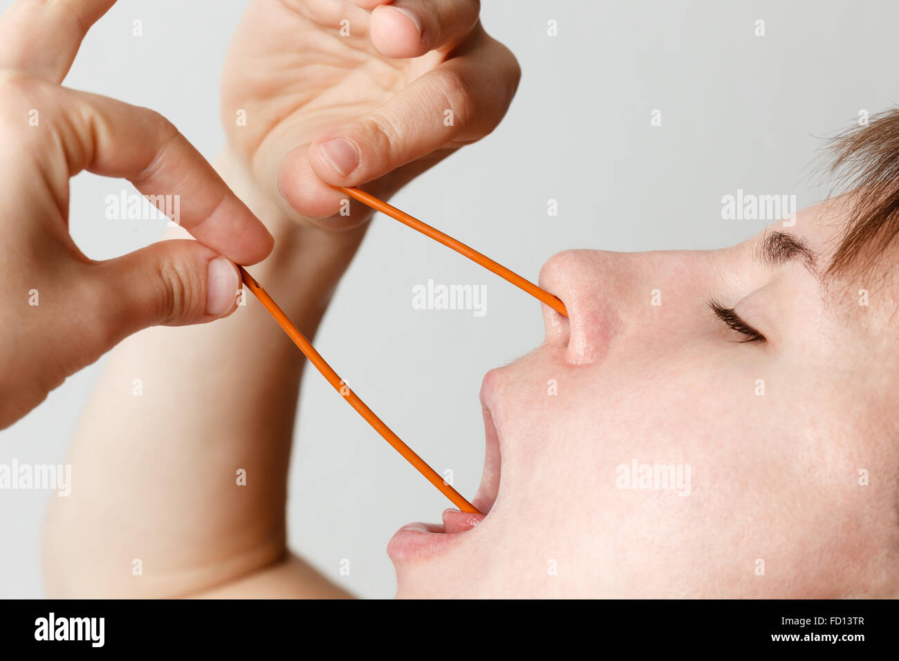 cold self rubber snot flu red concept adult Stock Photo - Alamy