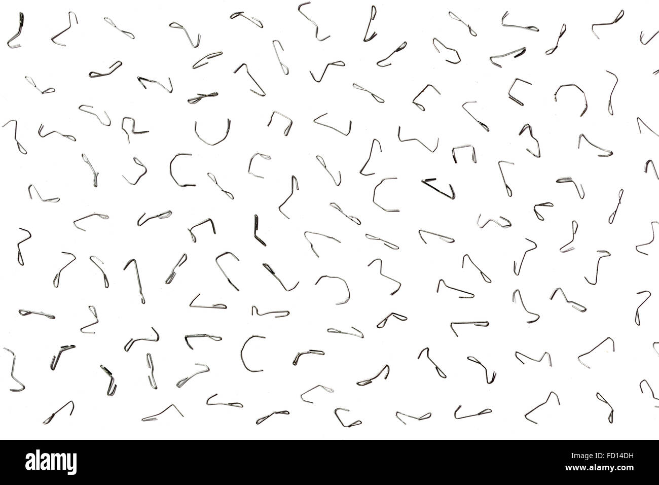 background of bent staples from a stapler Stock Photo
