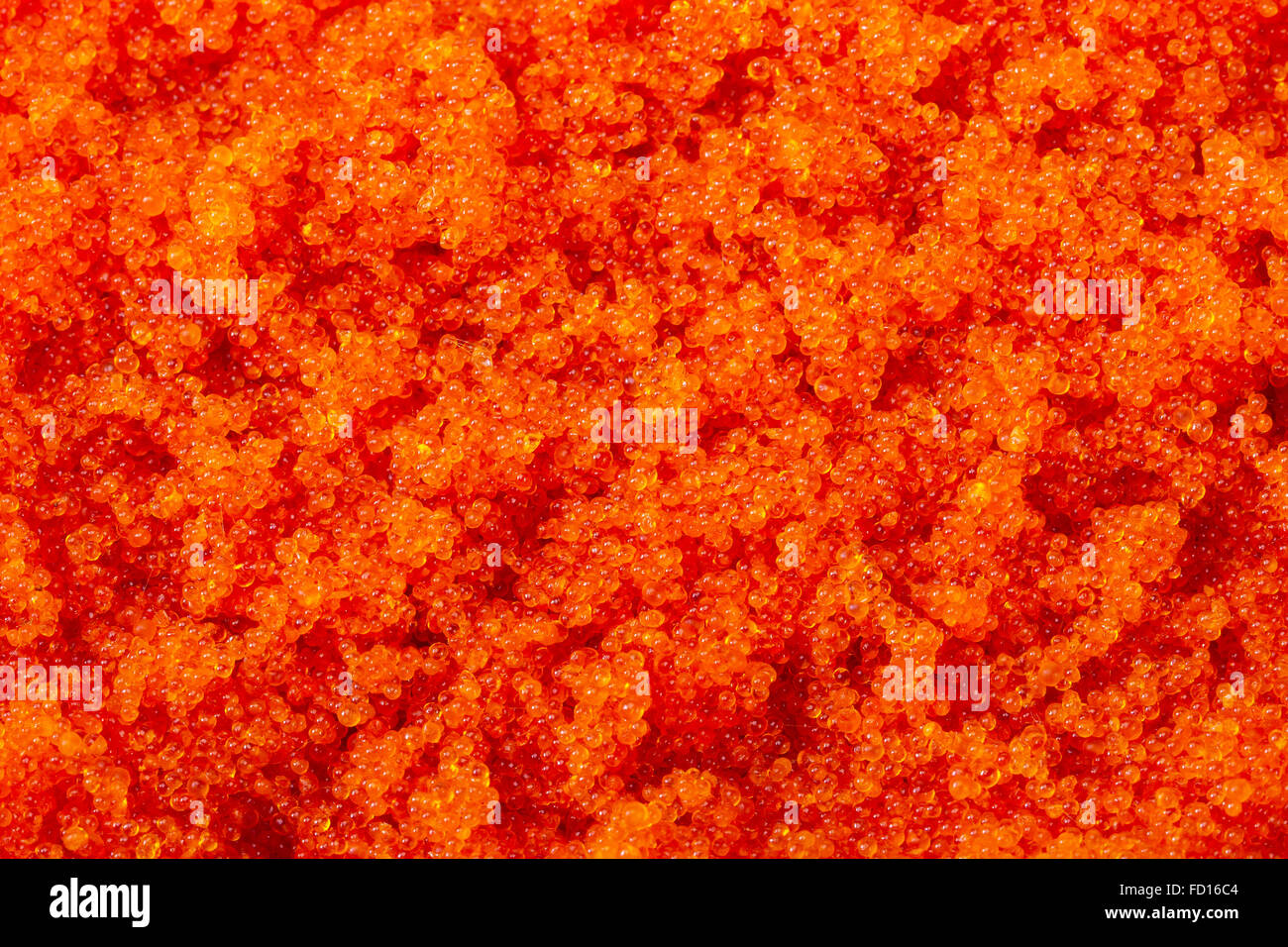 Lots of fresh red caviar trout macro background Stock Photo - Alamy