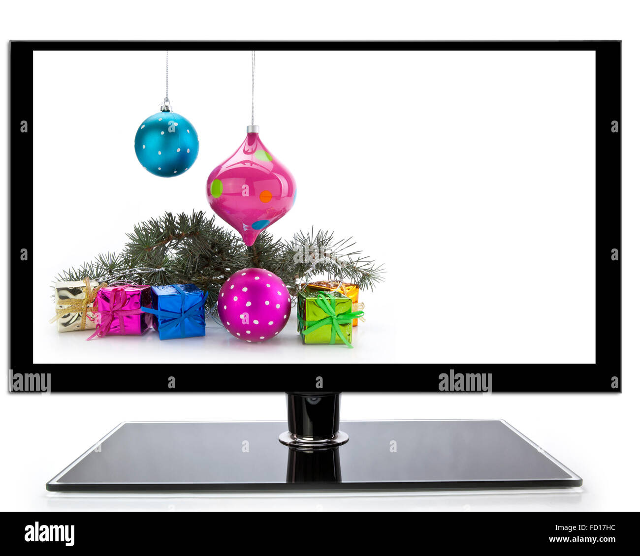 Flat screen TV with Christmas decoration on a white background with copy space Stock Photo