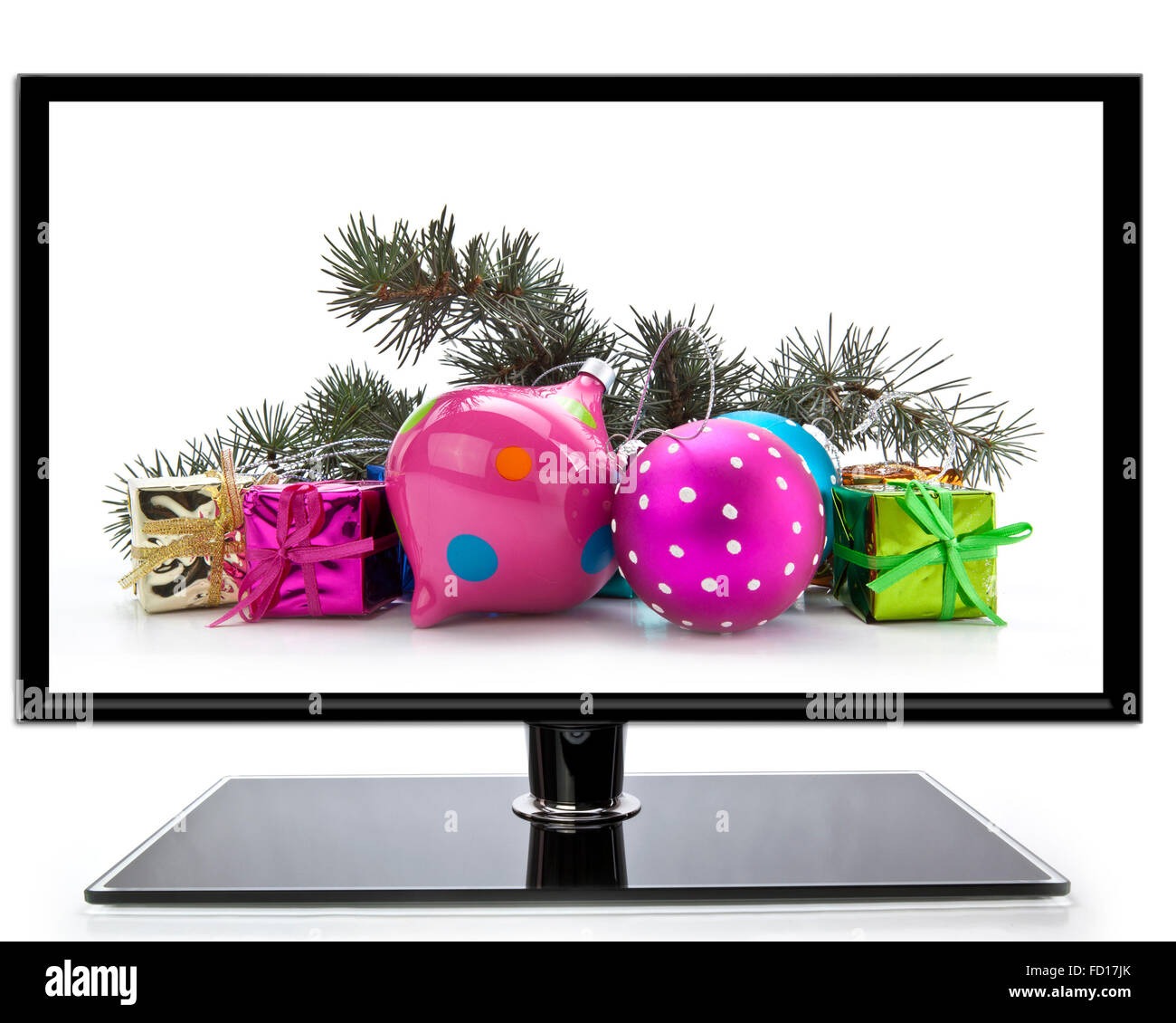 Flat screen TV with Christmas decoration on a white background Stock Photo