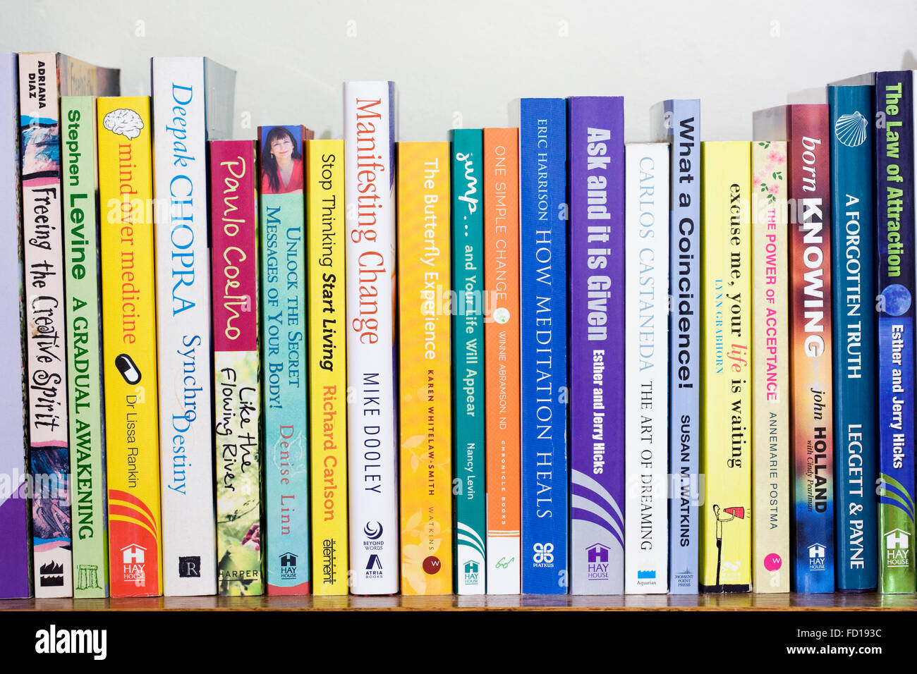 Self help books on a bookshelf. Stock Photo