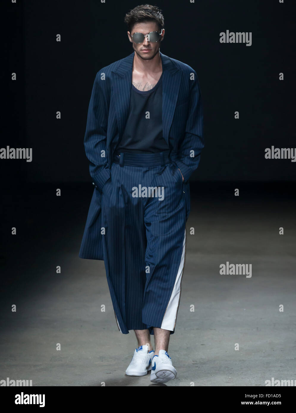NEW YORK, NY - JULY 14, 2015: Tyler Recher walks the runway during the ...