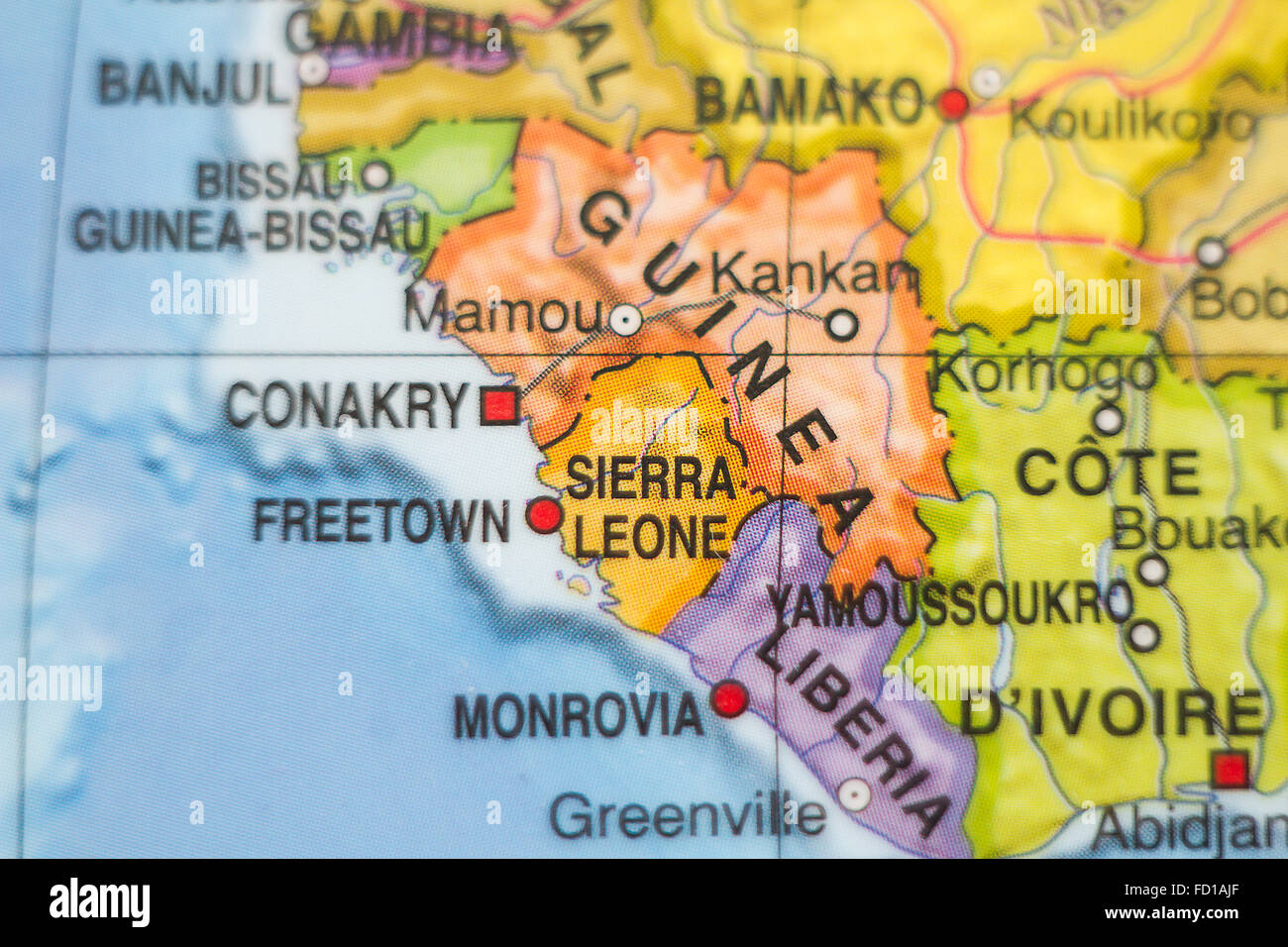 Photo of a map of Sierra Leone and the capital Freetown . Stock Photo