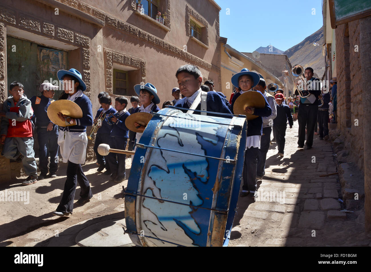 Children in a chapel in a festive procession during a Fiesta, Colquechaca in Potosi, Bolivia Stock Photo