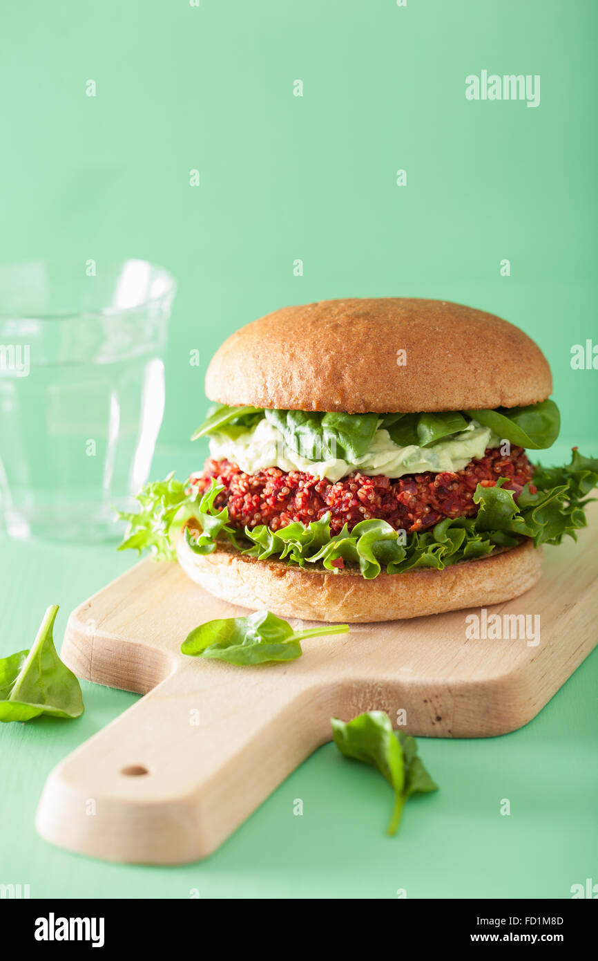 veggie beet and quinoa burger with avocado dressing Stock Photo Alamy