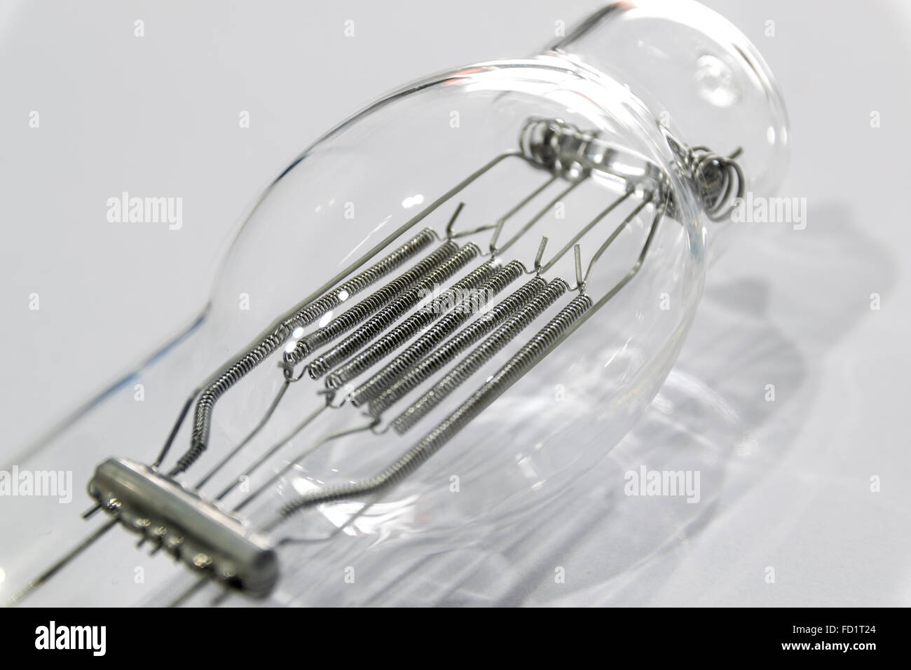 Incandescent lamp emitting light as a result of being heated. Stock Photo