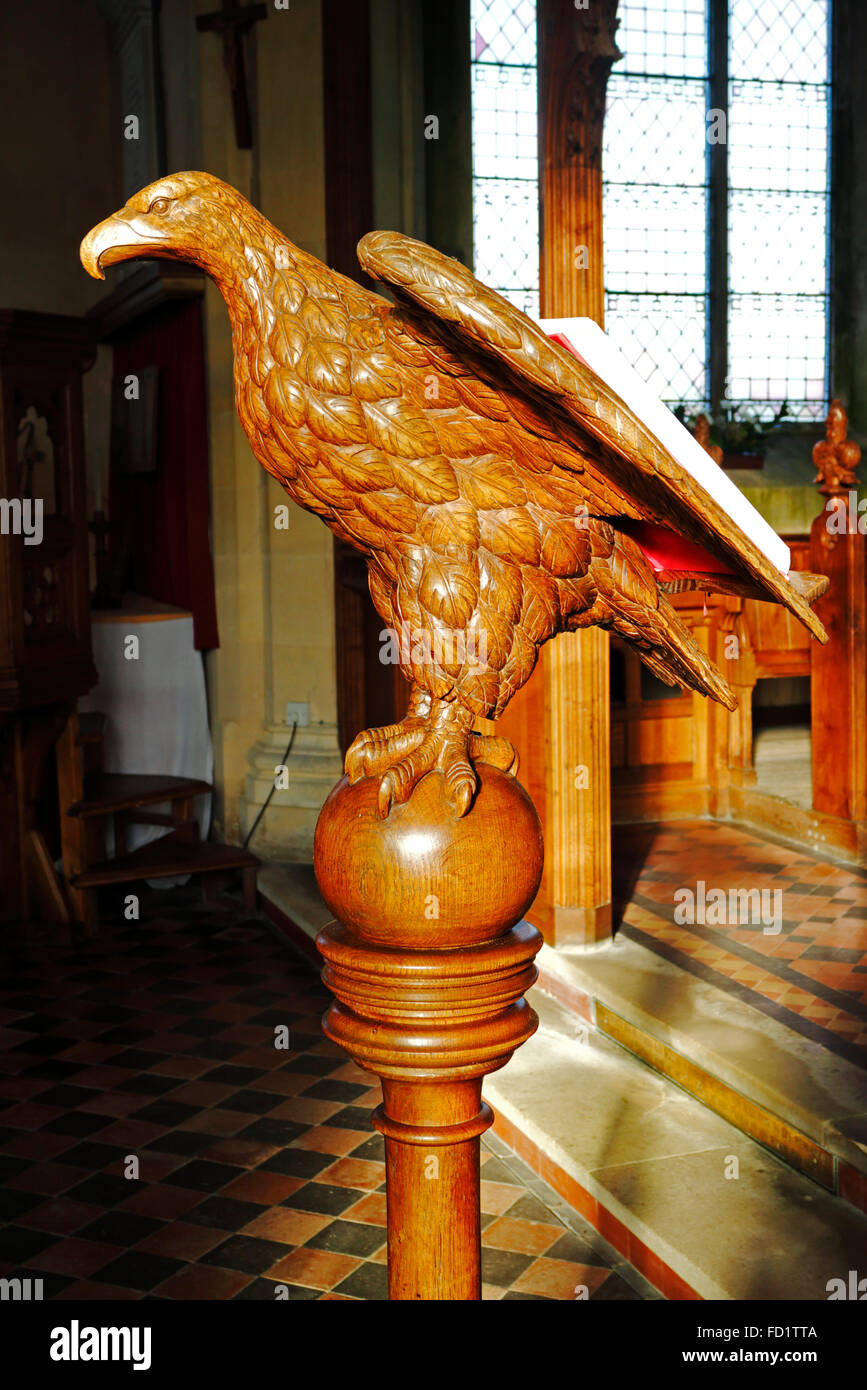 A carved eagle lectern in the parish church of the Holy Trinity and All Saints at Winterton, Norfolk, England, United Kingdom. Stock Photo