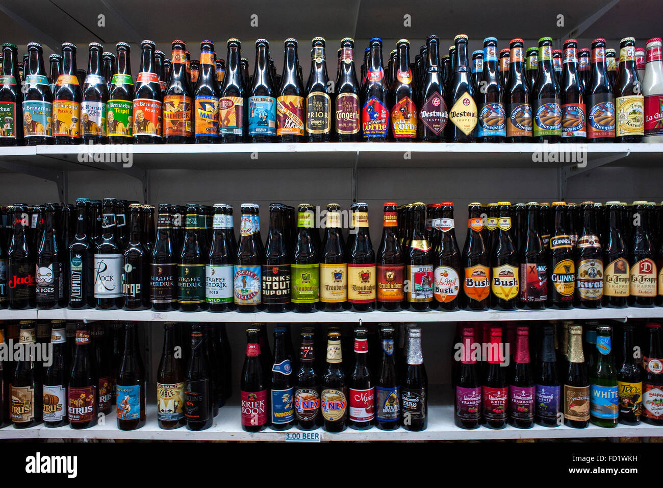 A display in a shop in Brussels with various brands of Belgian beer Stock Photo