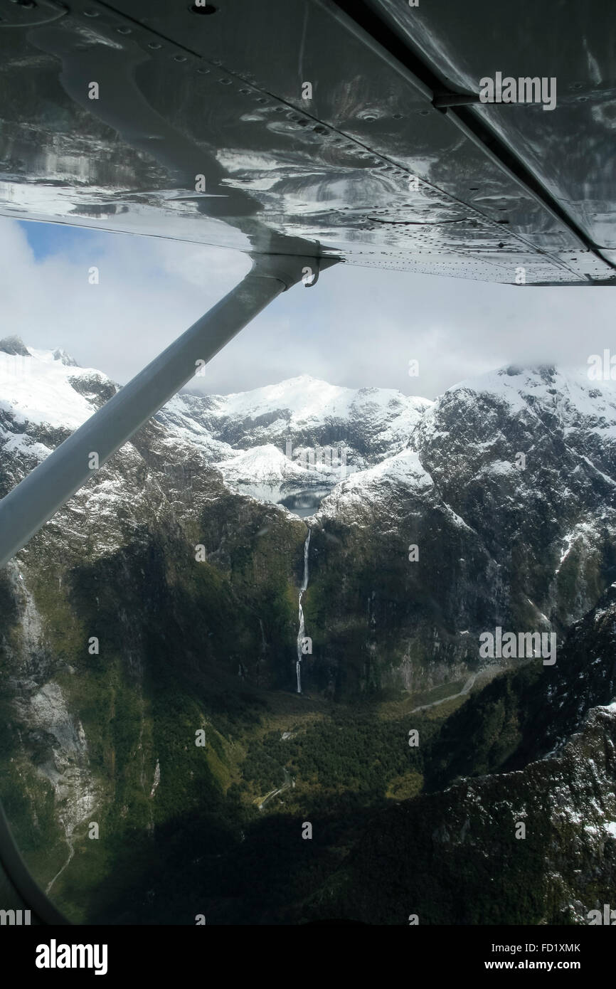 Milford Sound, New Zealand. Aerial view of Sutherland Falls from light aircraft. Stock Photo