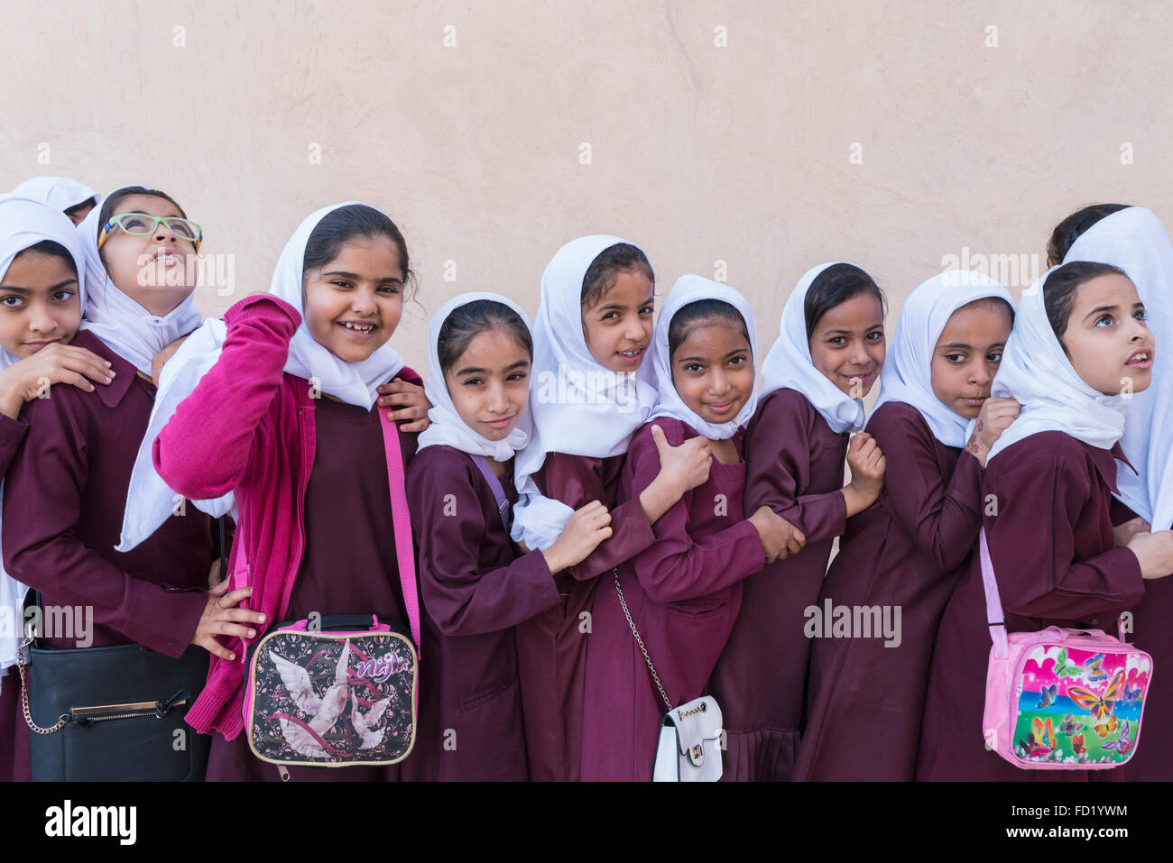 Omani schoolgirls visiting Nizwa Fort in Oman Stock Photo