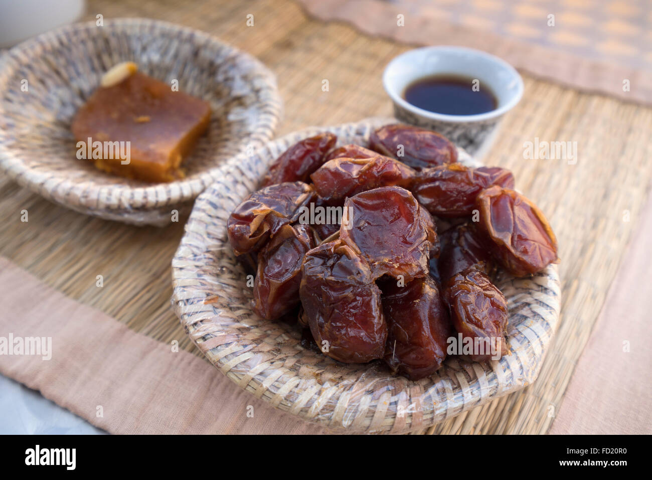 Traditional Oman breakfast of Dates, coffees and Halwa Stock Photo