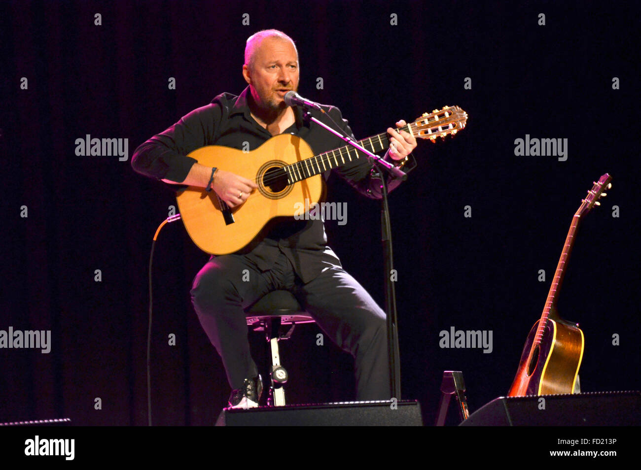 British musician Black aka Colin Vearncombe  plays on his guitar during his 'Acostic Tour 2015' in Munich, Germany, 25 November 2015. Vearncombe, known for his song  'Wonderful Life' from the 1980s died in hospital after a fatal car accident. Photo: Petra Schoenberger/Geisler-Foto/dpa Stock Photo