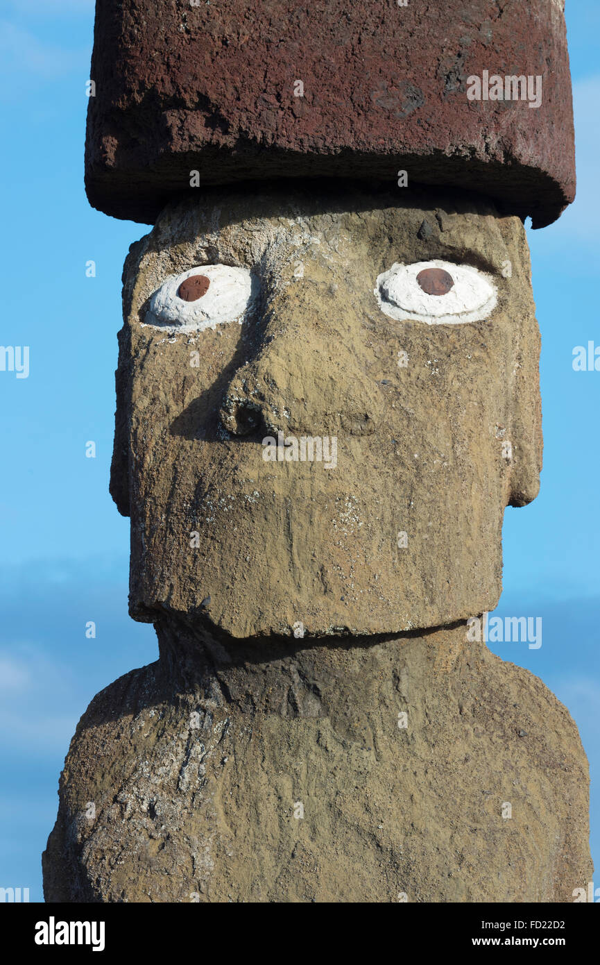 Moai wearing a Pukao (Topknots), Hanga Roa, Rapa Nui National Park, Easter Island, Chile, Unesco World Heritage Stock Photo