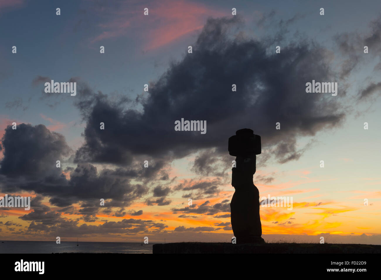 Tahai ceremonial complex at sunset, Hanga Roa, Rapa Nui National Park, Easter Island, Chile, Unesco World Heritage Stock Photo