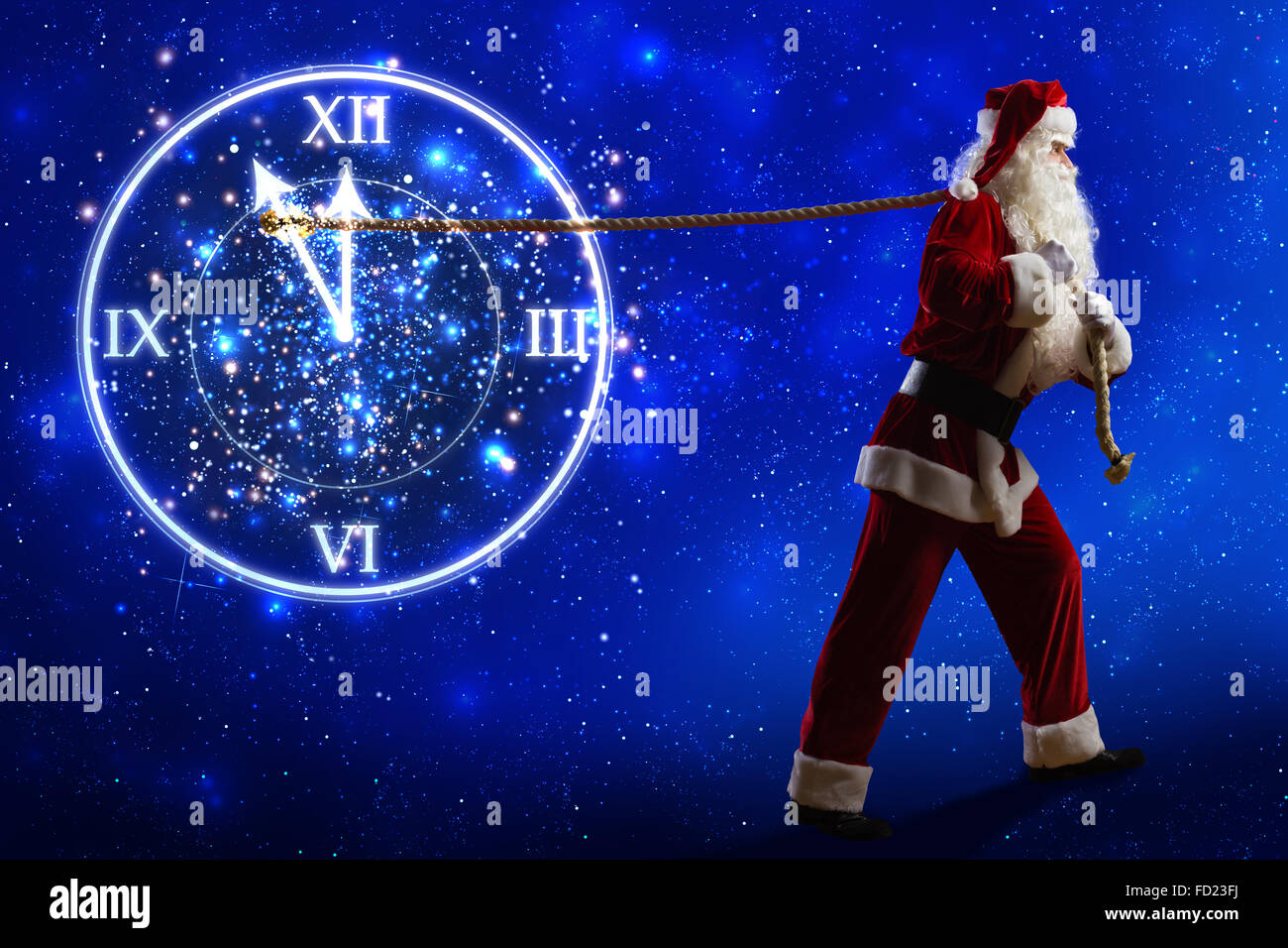 Santa Claus and clock showing five minutes to twelve Stock Photo - Alamy