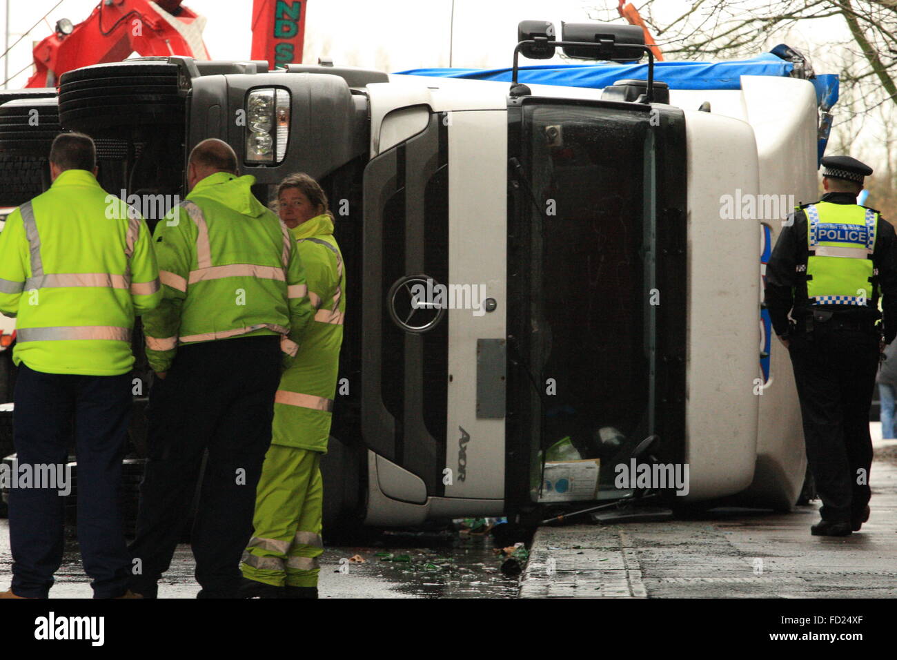Swindon, England. 27th January, 2016. Recovery teams work to remove the