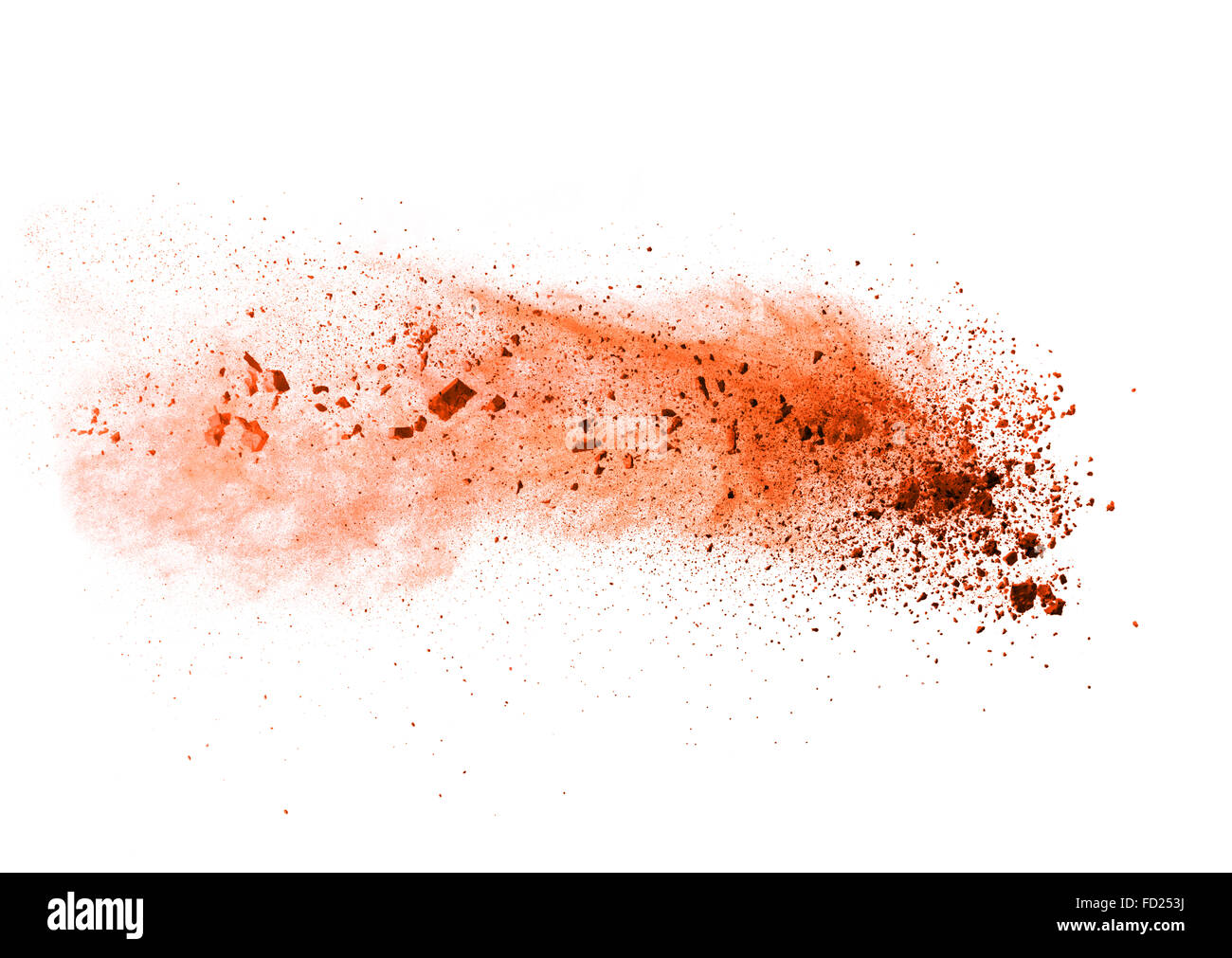 Explosion of orange powder, isolated on white background Stock Photo