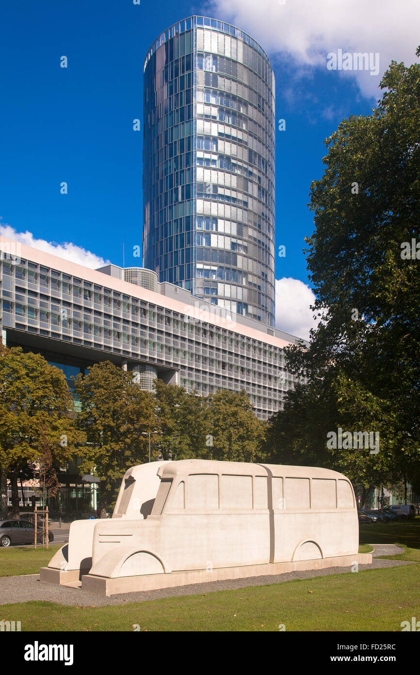 Europe, Germany, North Rhine-Westphalia, Cologne, Monument of the Grey Buses in front of the CologneTriangle tower in the distri Stock Photo