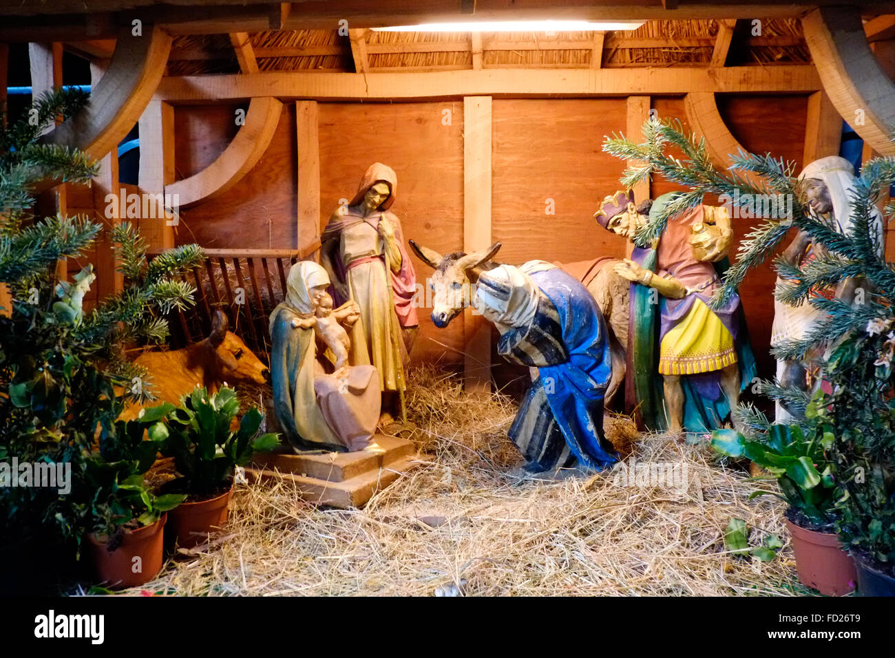 A nativity scene set up in a church at Christmas Stock Photo