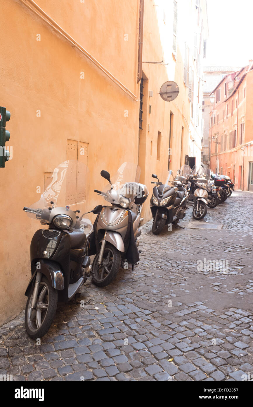 Moped Rome Mopeds parked side road hi-res stock photography and images - Alamy