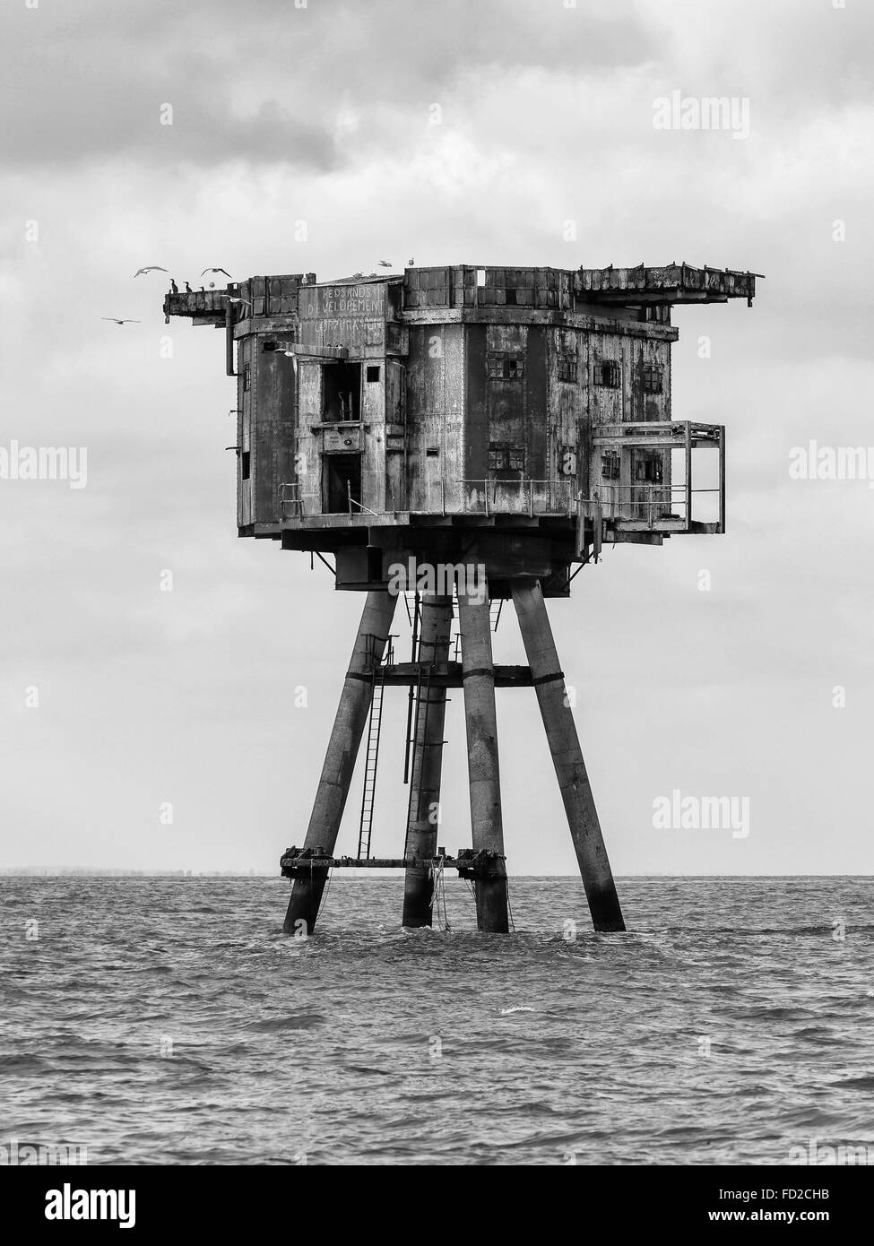 A black and white image of Maunsell Forts in Thames Estuary Stock Photo