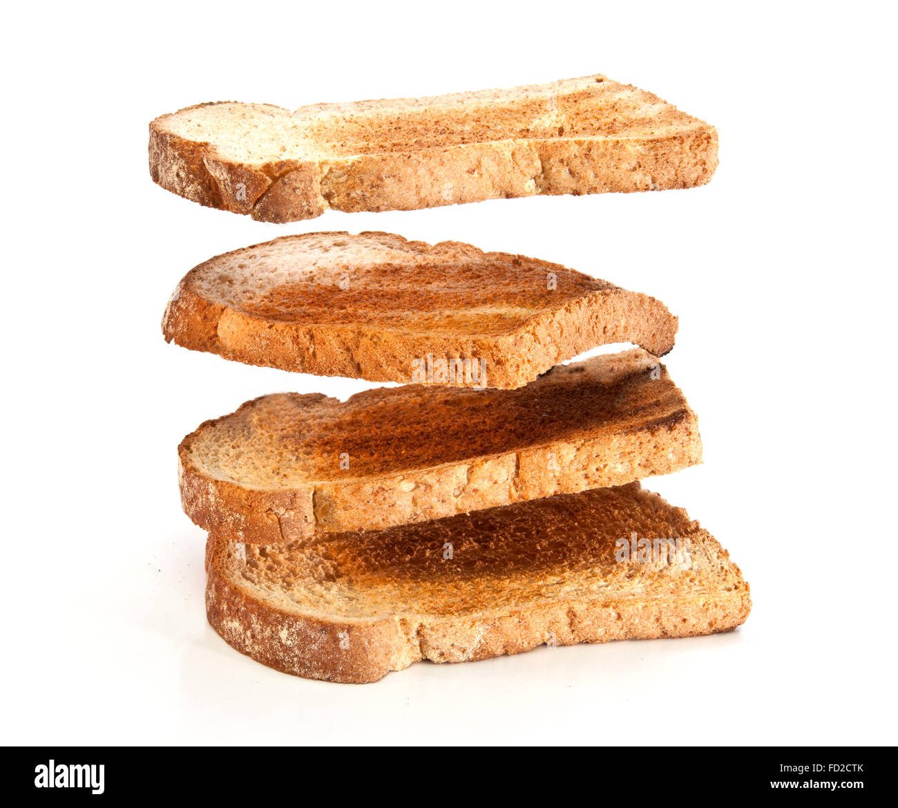 Pile of toast floating over a white background Stock Photo