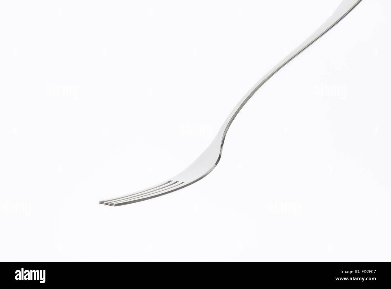Plain fourpronged metal dinner fork Stock Photo Alamy