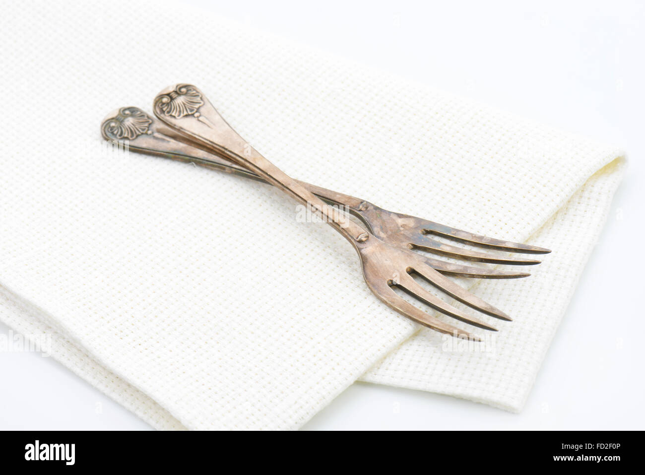 Vintage ornate forks with three tines Stock Photo