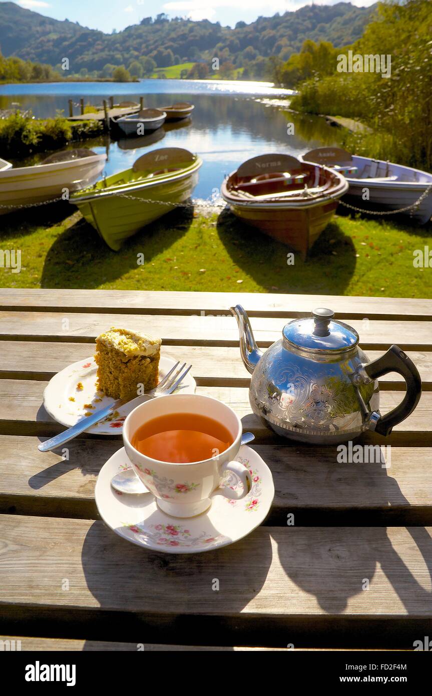 The Lake District. Afternoon Tea in front of beached boats. Grasmere